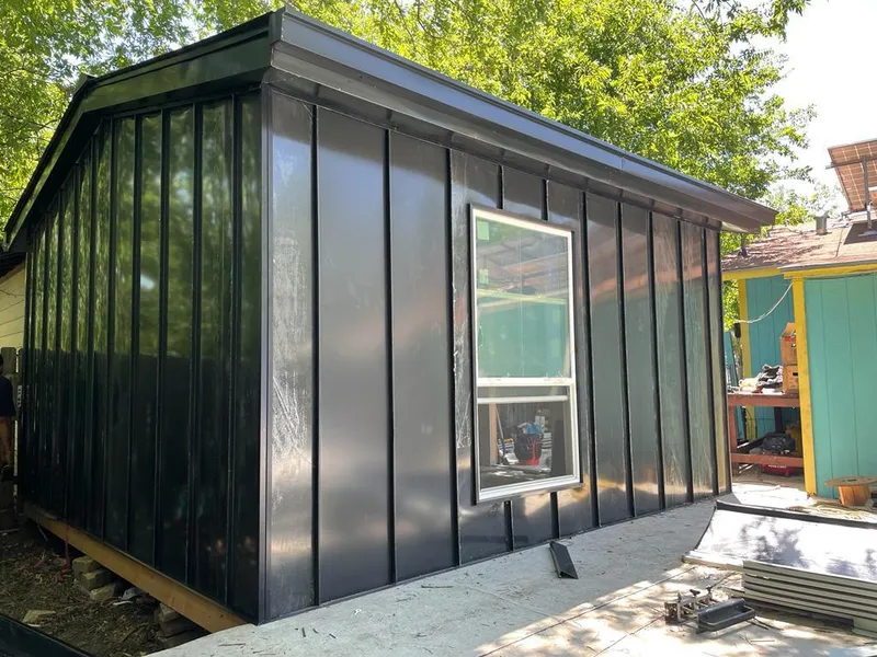 Black standing seam metal wall panels for Roof Inspection in El Monte